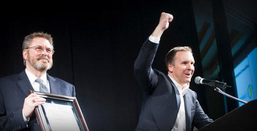 Darik receiving award for software company of the year